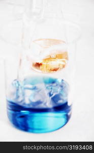 Close-up of a beaker and a conical flask