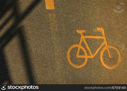Close-up of a bicycle lane symbol on a road