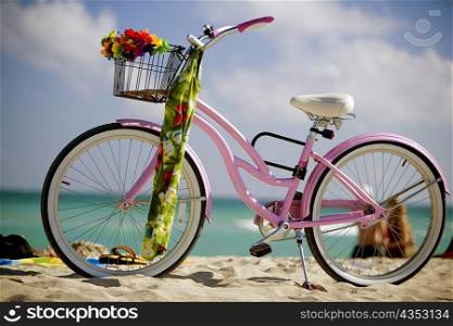 Close-up of a bicycle on the beach, South Beach, Miami, Florida, USA