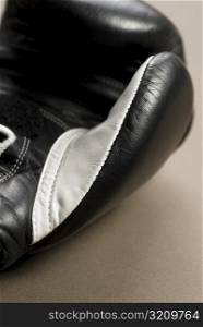 Close-up of a black boxing glove