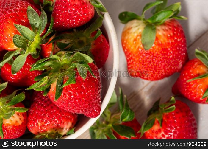 close up of a bowl of strawberries