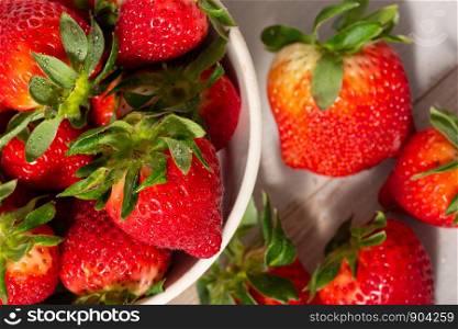 close up of a bowl of strawberries