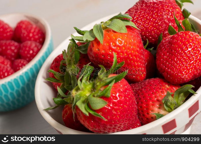 close up of a bowl of strawberries