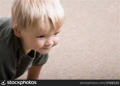 Close-up of a boy crawling
