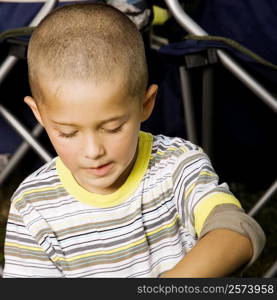 Close-up of a boy looking down