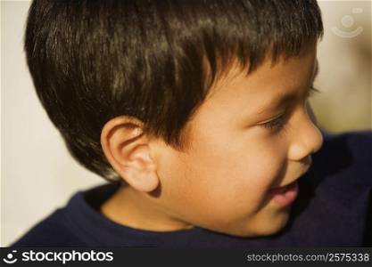 Close-up of a boy looking sideways