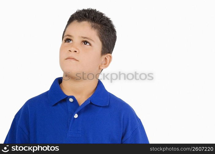 Close-up of a boy looking up