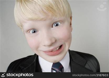 Close-up of a boy making a face