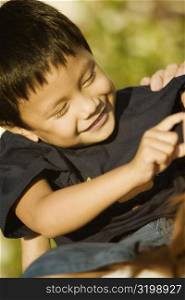 Close-up of a boy playing