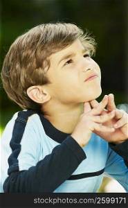 Close-up of a boy thinking