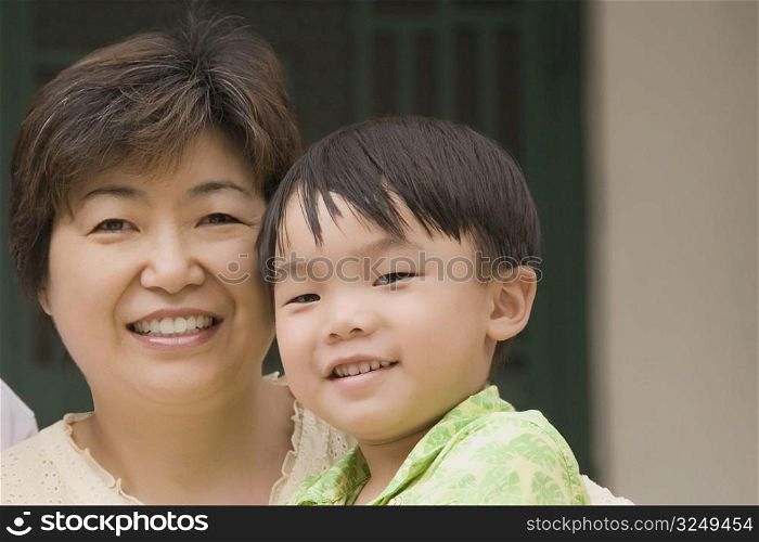 Close-up of a boy with his grandmother