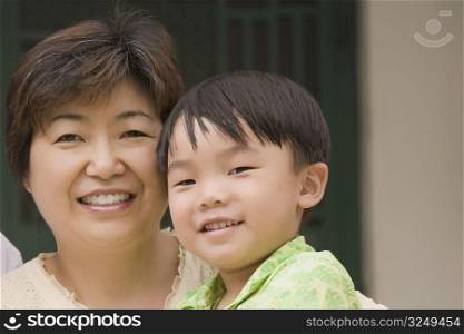 Close-up of a boy with his grandmother