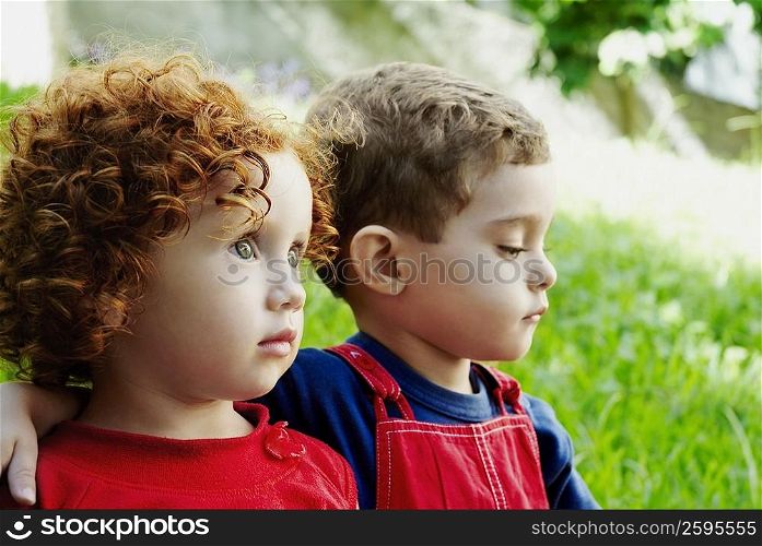 Close-up of a boy with his sister