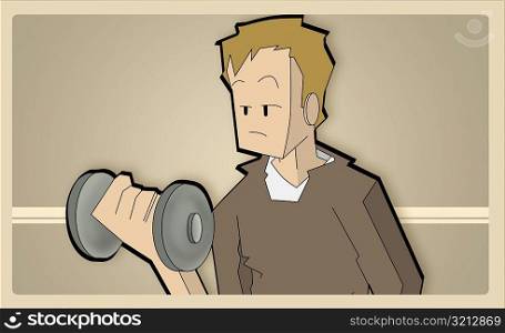 Close-up of a boy working out with a dumbbell