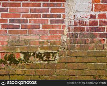 Close up of a brick wall, new and old constructions together, textures and copy space