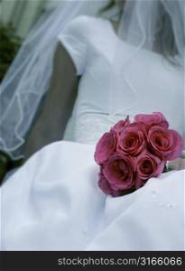 Close up of a bride holding a boquet