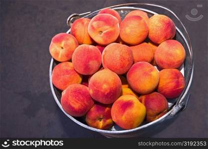 Close-up of a bucket of peaches, Zacatecas, Mexico