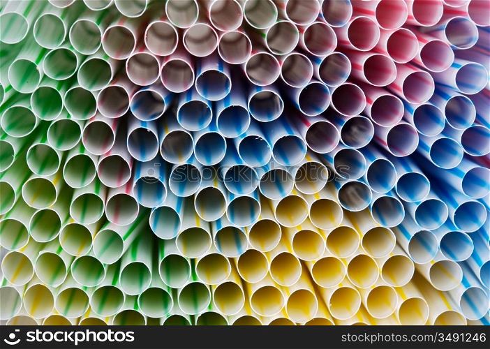Close-up of a bunch of bright colored straws