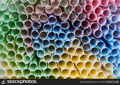 Close-up of a bunch of bright colored straws