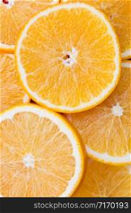 Close-up of a bunch of oranges sliced. Free space for text.. Close-up of a bunch of oranges sliced. Free space for text