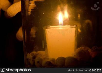Close-up of a burning candle in a glass jar, Sayulita, Nayarit, Mexico