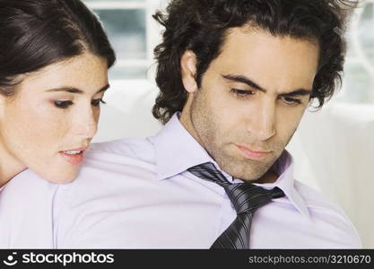 Close-up of a businessman and a businesswoman