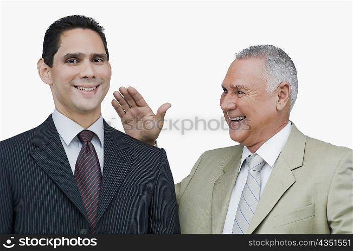 Close-up of a businessman appreciating another businessman