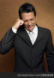 Close-up of a businessman crying