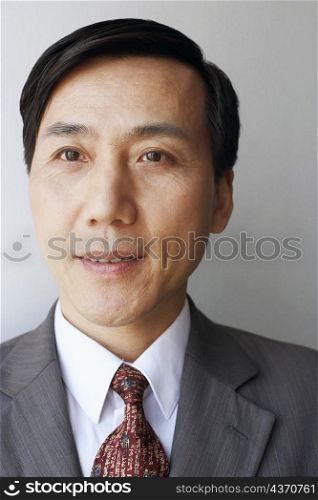 Close-up of a businessman looking away