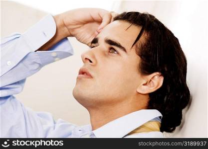 Close-up of a businessman looking up