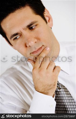 Close-up of a businessman looking worried