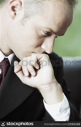 Close-up of a businessman looking worried