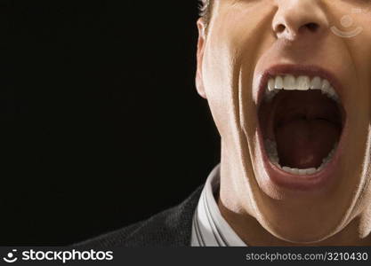 Close-up of a businessman shouting