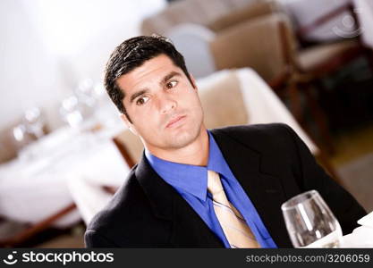 Close-up of a businessman sitting in a restaurant