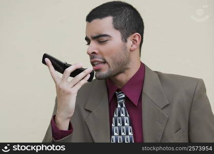 Close-up of a businessman talking on a mobile phone