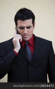 Close-up of a businessman talking on a mobile phone