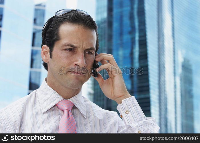 Close-up of a businessman talking on a mobile phone