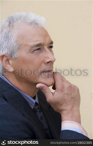 Close-up of a businessman thinking