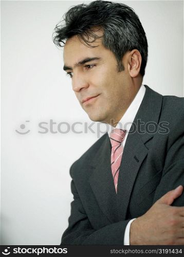 Close-up of a businessman thinking