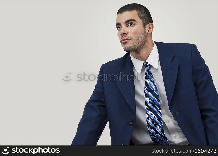 Close-up of a businessman thinking in an office
