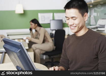 Close-up of a businessman using a computer