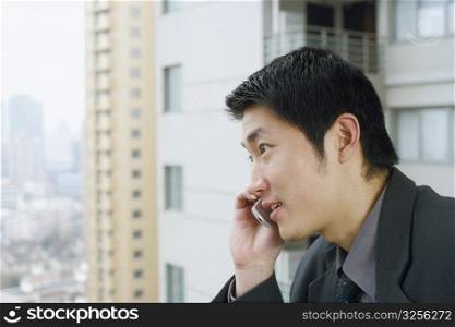 Close-up of a businessman using a mobile phone