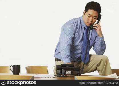 Close-up of a businessman using the telephone