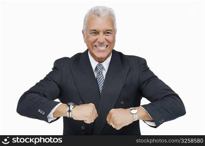 Close-up of a businessman wearing two wristwatches