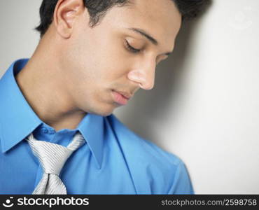 Close-up of a businessman with his eyes closed