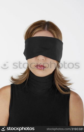 Close-up of a businesswoman blindfolded