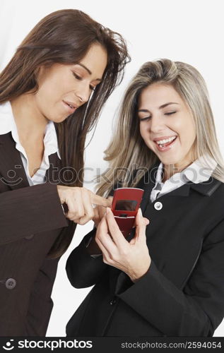 Close-up of a businesswoman holding a mobile phone