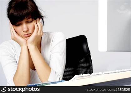 Close-up of a businesswoman looking depressed