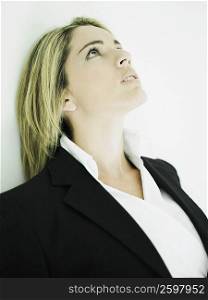 Close-up of a businesswoman looking up