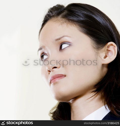 Close-up of a businesswoman looking worried